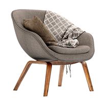 Modern looking Hay Armchair with blanket and cushion