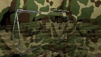camoflaged sniper rifle