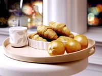 Tray with Croissants and Oranges